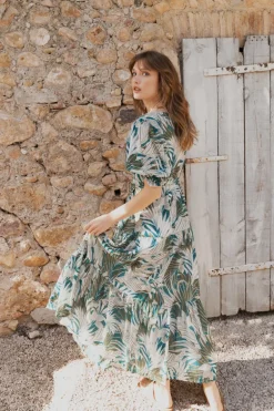 Longue robe portefeuille à volants
