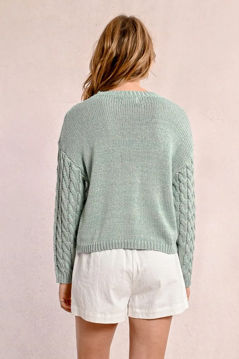 Pull en maille torsadé, manches longues