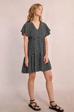 Robe courte, évasée à pois